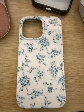 Velvet Caviar White Phone Case with Blue Floral Print